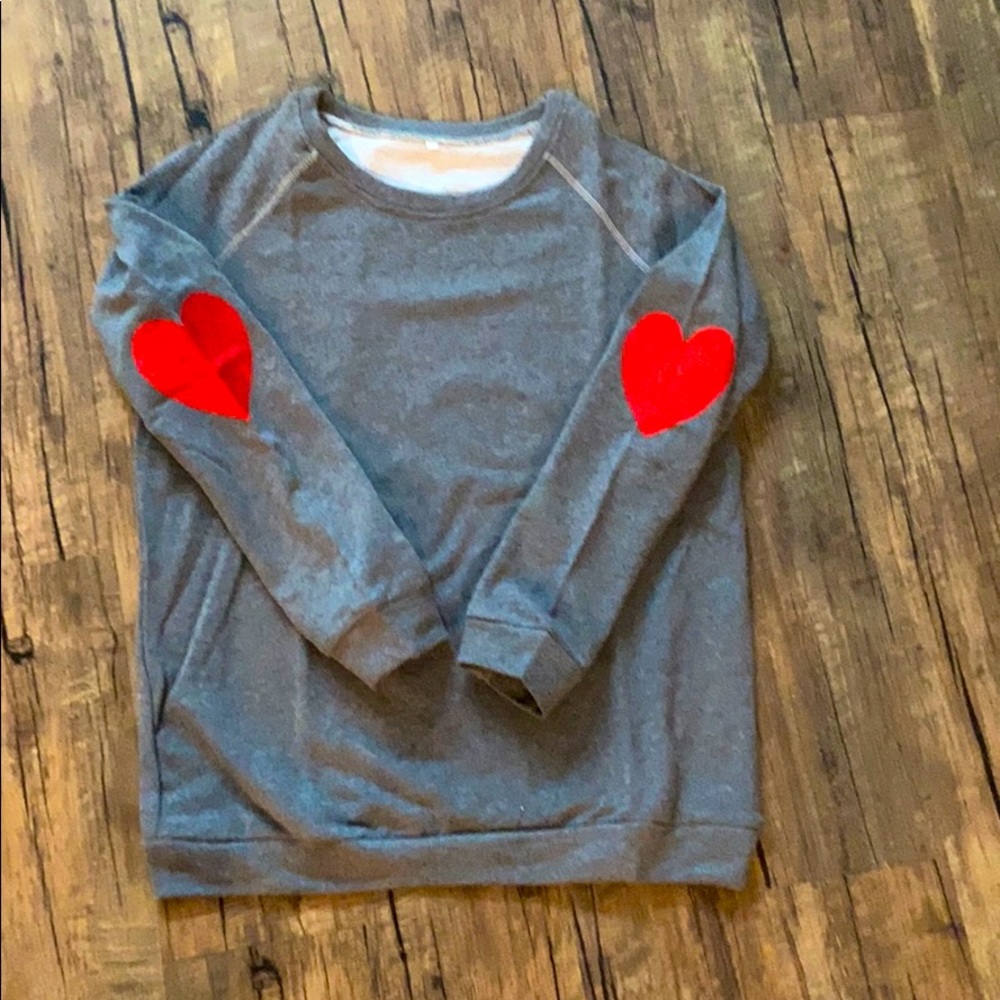 Red heart on the elbows sweatshirt L NWT